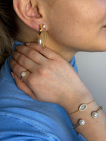 Load image into Gallery viewer, Dangling Fresh Water Pearl Half Hoop Earrings In Gold Vermeil - Nili Gem
